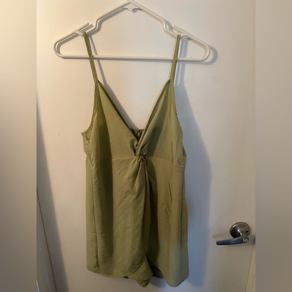 Brand New/never worn romper size large